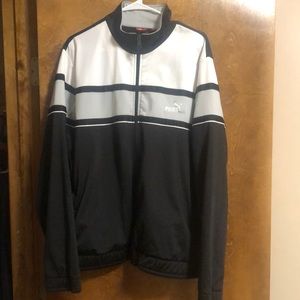 Puma zip over has a stain